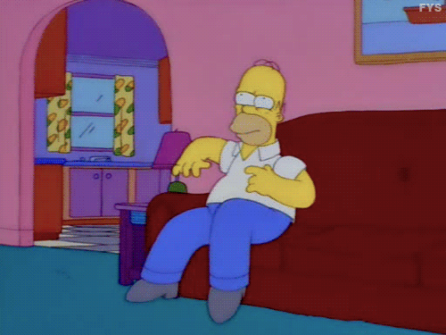A gif of Homer Simpson shifting around on the couch.