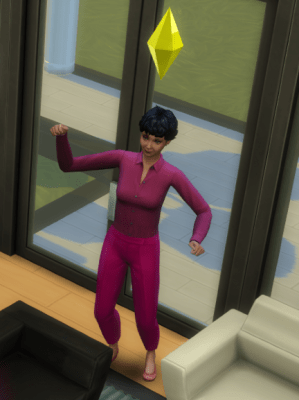 A brown-skinned Sim character wearing a burgundy outfit dances next to a white couch.