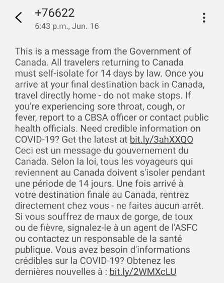 Screen cap of text reads: This is a message from the Government of Canada. All travelers returning to Canada must self-isolate for 14 days by law. Once you arrive at your final destination back in Canada, travel directly home - do not make stops. If you're experiencing sore throat, cough, or fever, report to a CBSA officer or contact public health officals. Need credible information on COVID-19? Get the latest at bit.ly/3ahXXQO. This message is then repeated in French.