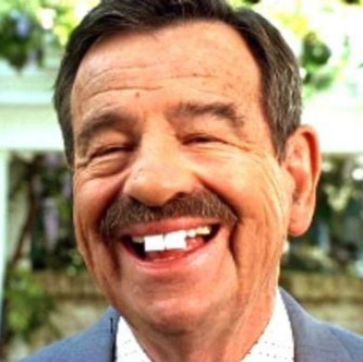The late Walter Matthau as Mr. Wilson grinning. The two front teeth have been swapped for Chiclets.